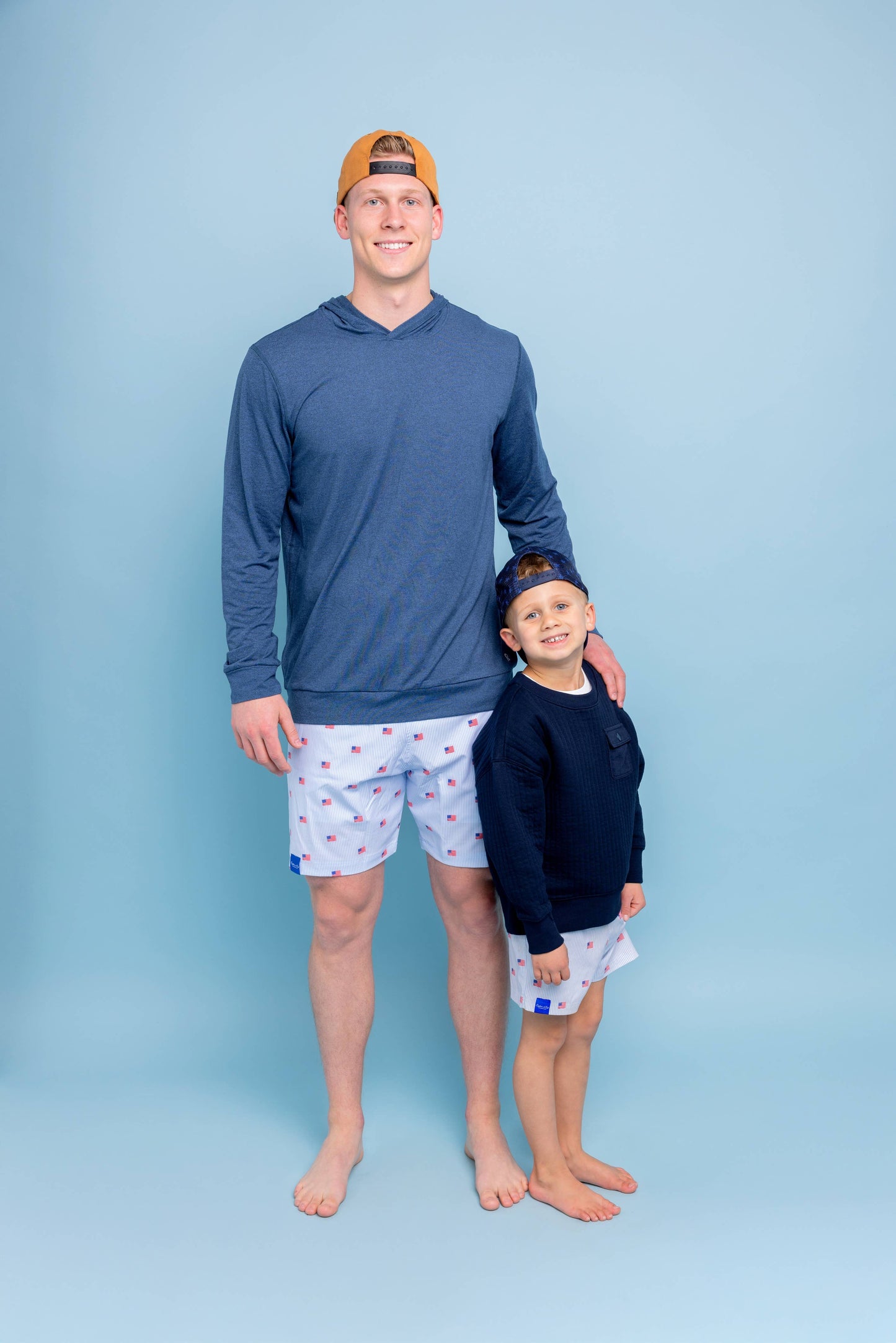 MEN’S FLAG SWIM TRUNKS