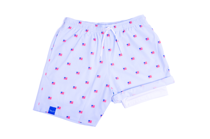 MEN’S FLAG SWIM TRUNKS